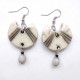 Boucles d'oreilles originales blancheur nature