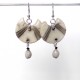 Boucles d'oreilles originales blancheur nature