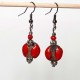 Boucles d'oreilles ethniques lumineuses en rouge et noir