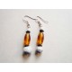 Boucles d'oreilles blanches éclat jaune