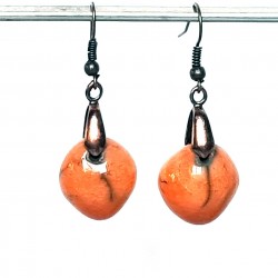 Boucles d'oreilles oranges gaies et lumineuses
